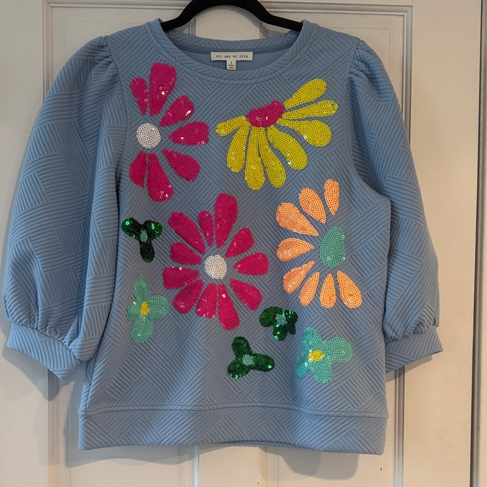 See and Be Seen Light Blue Sequin Flower Pullover Sweatshirt. Size small